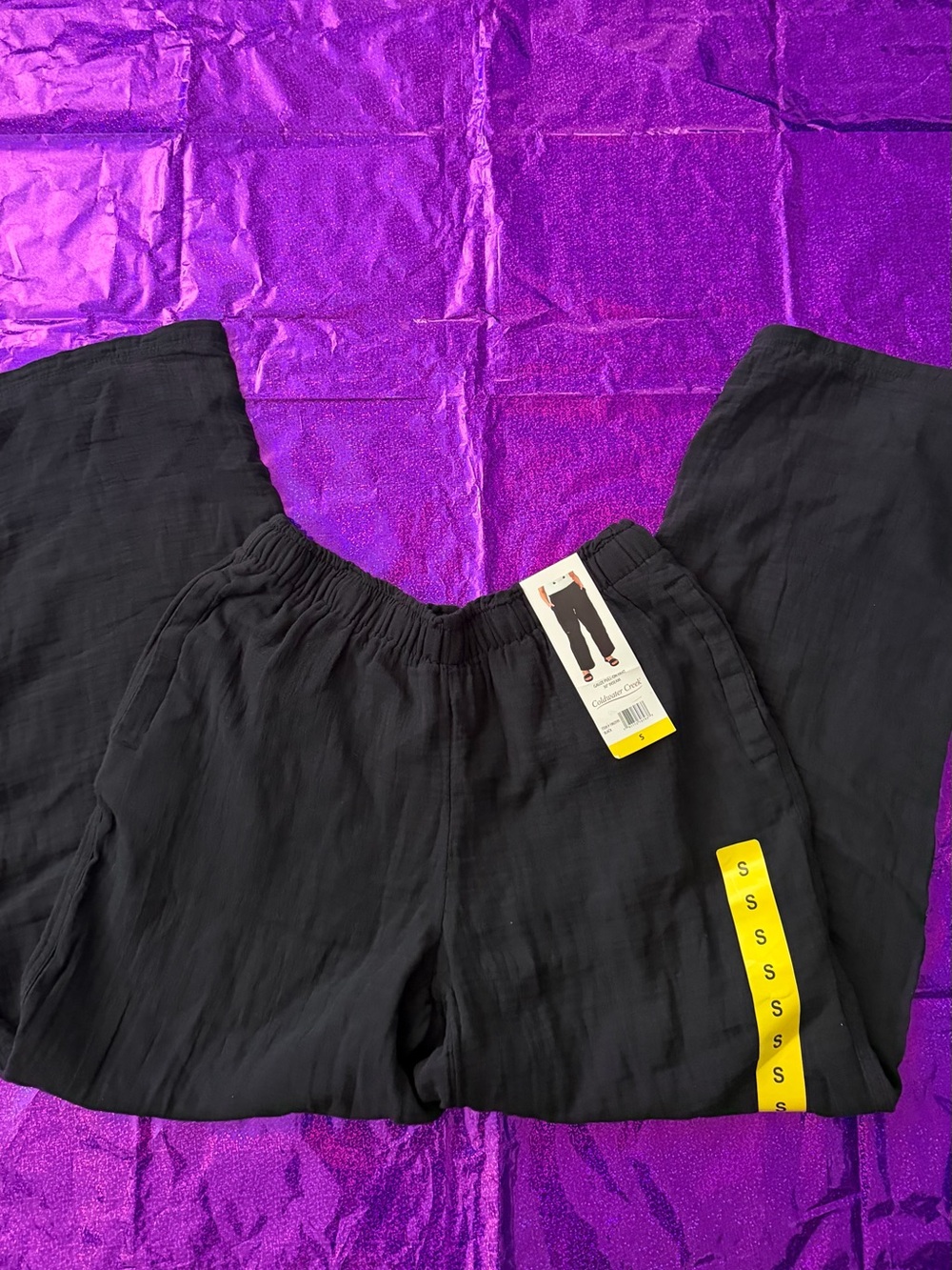 Women pull on pants